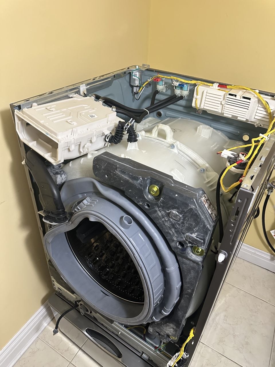KLIA NY technician performing washer service